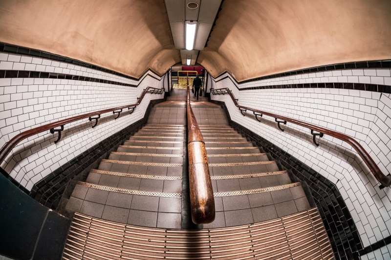 pottery, mode of transportation, steps and staircases, technology, vase, staircase, prison, campus, built structure, illuminated, public transportation