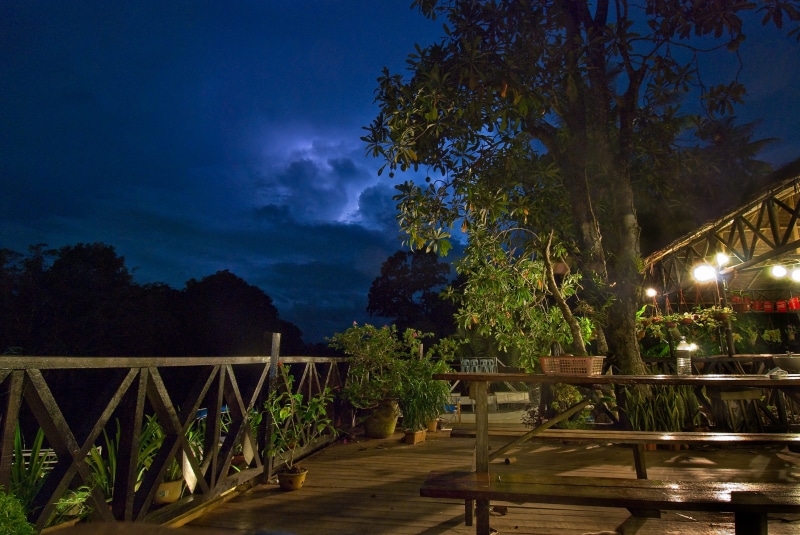 footpath, sky, hardwood, footbridge, 2K, arbour, lighting equipment, garden, plant, bridge, outdoors, building, hotel, bench, porch, nature, boardwalk