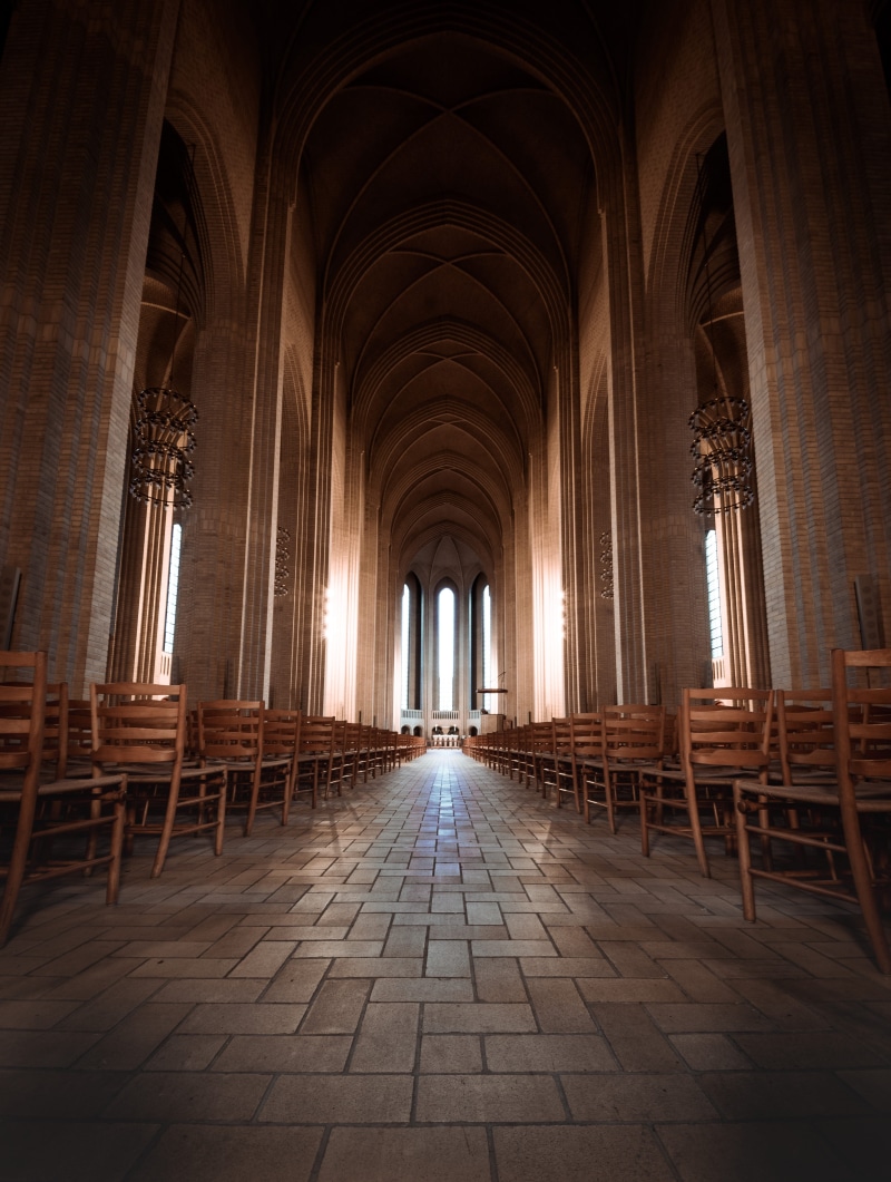 transportation, corridor, furniture, seat, spirituality, aisle, brown, housing, building, chairs, banister, hall, floor, ceiling, no people, religion, flooring