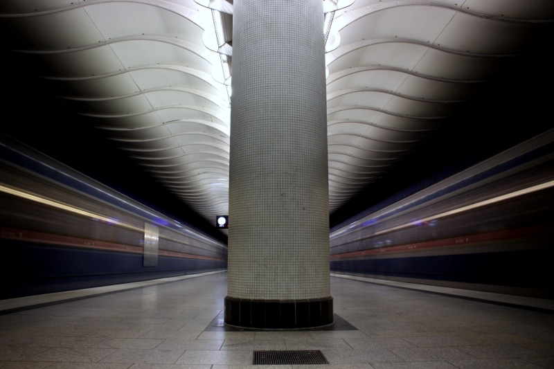 long exposure, handrail, vehicle, column, crypt, built structure, indoors, on the move, lapse, banister, pillar, terminal, speed, subway train, time, no people