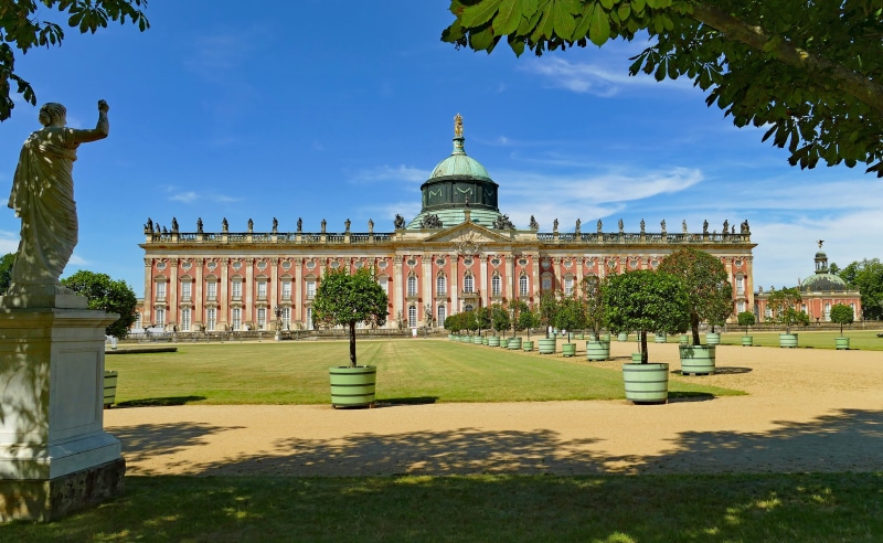 grass, travel, tourist attraction, sky, facade, outdoors, noble, castle garden, building, plant, new palais, built structure, green color, castle park