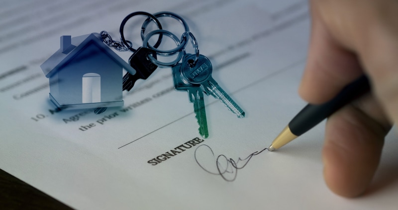 occupation, table, high angle view, property, brokers, sale, market, indoors, human body part, real estate agents, holding, house, hand, healthcare and medicine