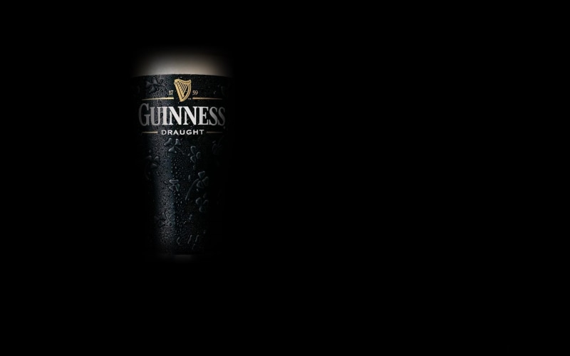 black background, guinness, macro, currency, beer, backgrounds, still life, bottle, the dark background, savings, cold, studio shot, wealth, indoors, metal