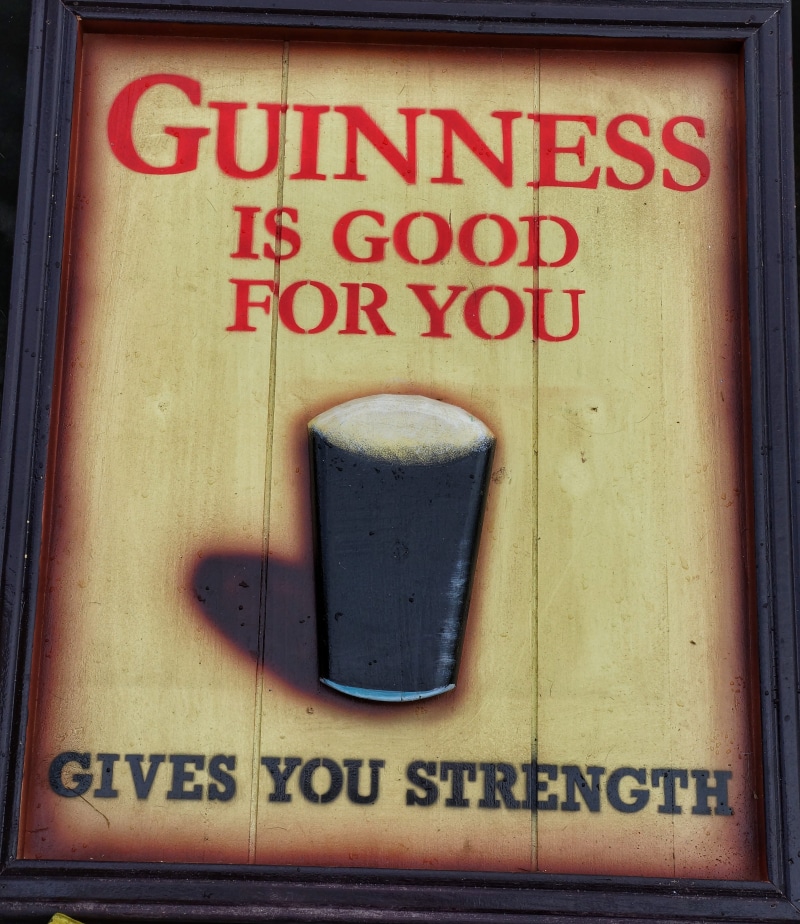non-western script, guinness, outdoors, script, 4K, refueling, no people, metal, information sign, ireland, number, western script, signage, information