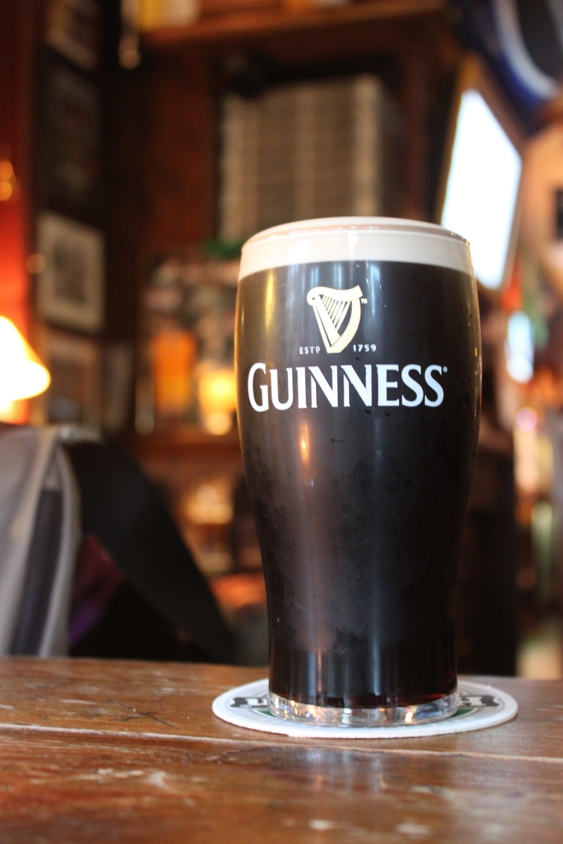 mug, Guinness, text, table, still life, pint, coffee shop, no people, coffee - drink, cup, Beer, guinness, glass, Glass, coffee, focus on foreground, irish