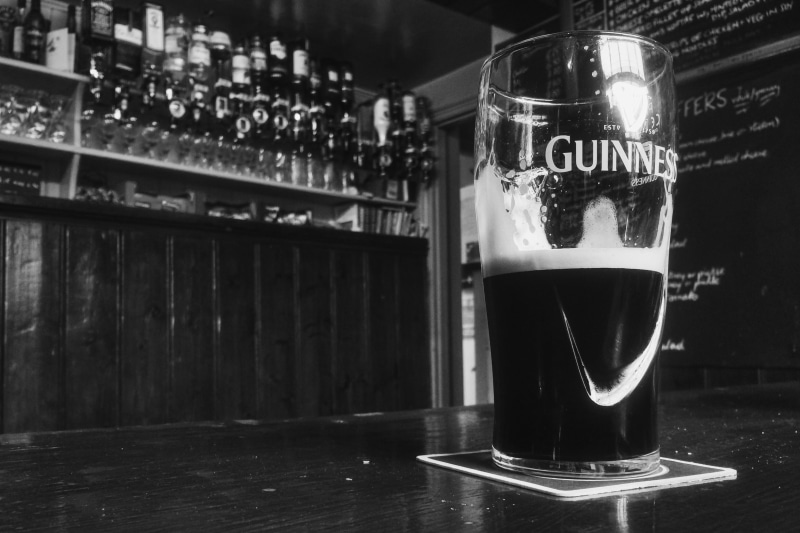 glass - material, froth, stout, table, drinking, glass, focus on foreground, dark, 2K, ale, beer, draft, bar, no people, beverage, bar - drink establishment