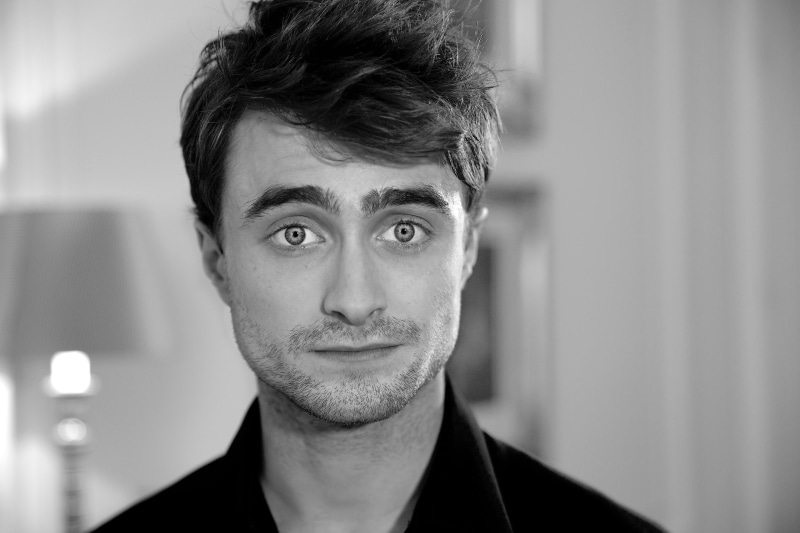 contemplation, real people, hairstyle, young men, looking at camera, British actor, young adult, indoors, Daniel Radcliffe, the Guinness book of records