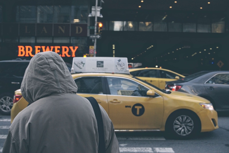 new york city, cars, taxi, umbrella, metro, communication, people, city, built structure, brewery, men, non-western script, script, newspaper, clothing
