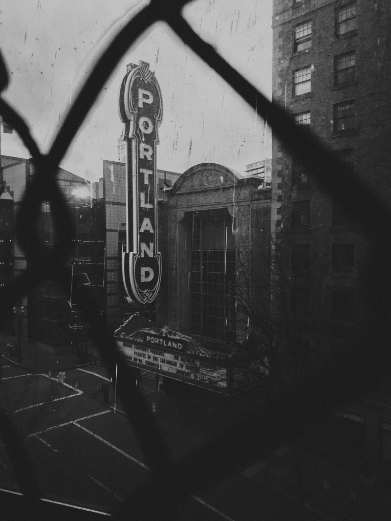 city, building, western script, photography, urban, window, town, theater, reflection, outdoors, no people, grayscale, indoors, portland, storefront, information sign