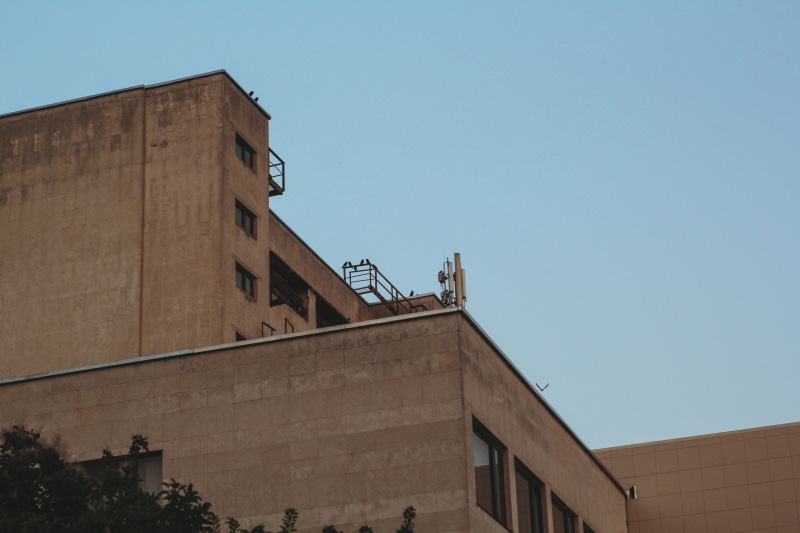 clear sky, urban, handrail, sky, window, manufacturing, wall - building feature, architecture, observatory, refinery, nature, day, power plant, building exterior