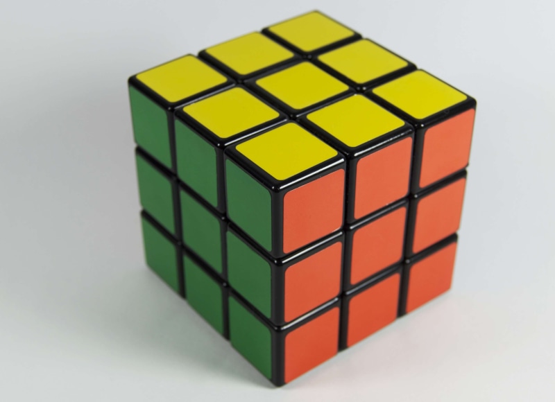 no people, close-up, design, white background, classic, indoors, colorful, cubic, puzzle, multi colored, cube shape, cube, studio shot, gray, toy, shape