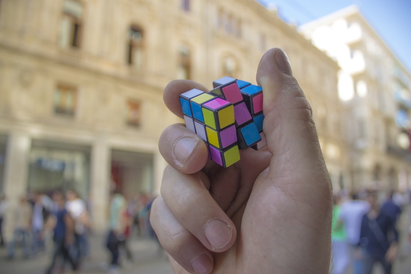 building exterior, beyoğlu, cubic, close-up, city, background, street, cube, architecture, taksim, hand, outdoors, focus on foreground, art, adult, one person