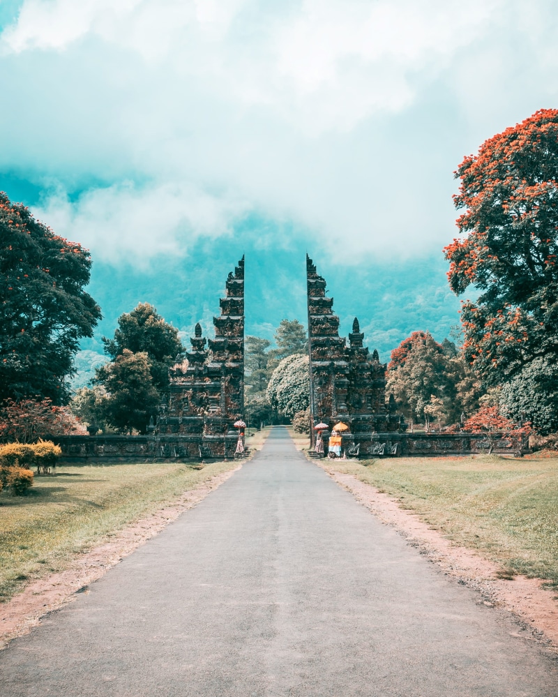 day, summer, road, travel destinations, ancient civilization, bali, sky, arch, plant, gate, scenic, vanishing point, the past, tree, daylight, building exterior