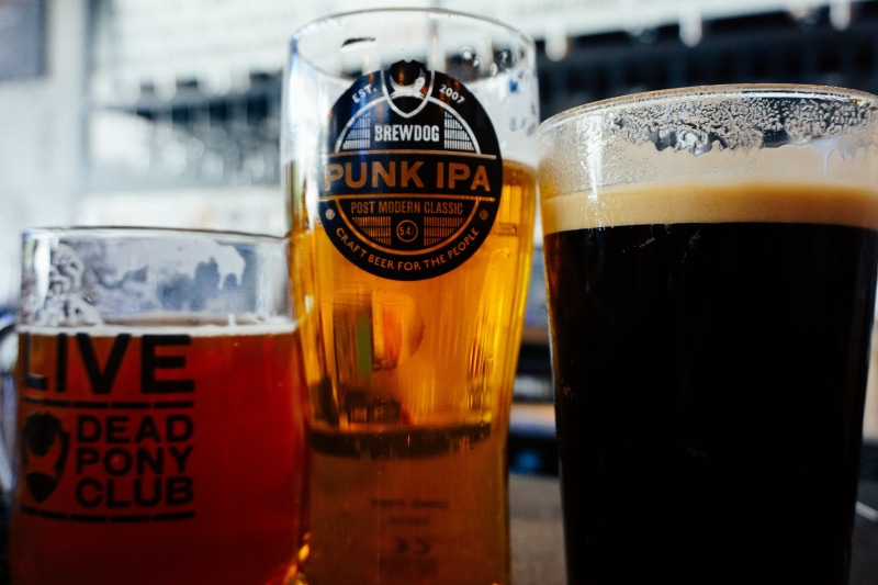 close-up, beer glass, drink, cold temperature, stout, ipa, alcohol, borough of camden, food and drink, lager, text, bar counter, brewdog camden, glass