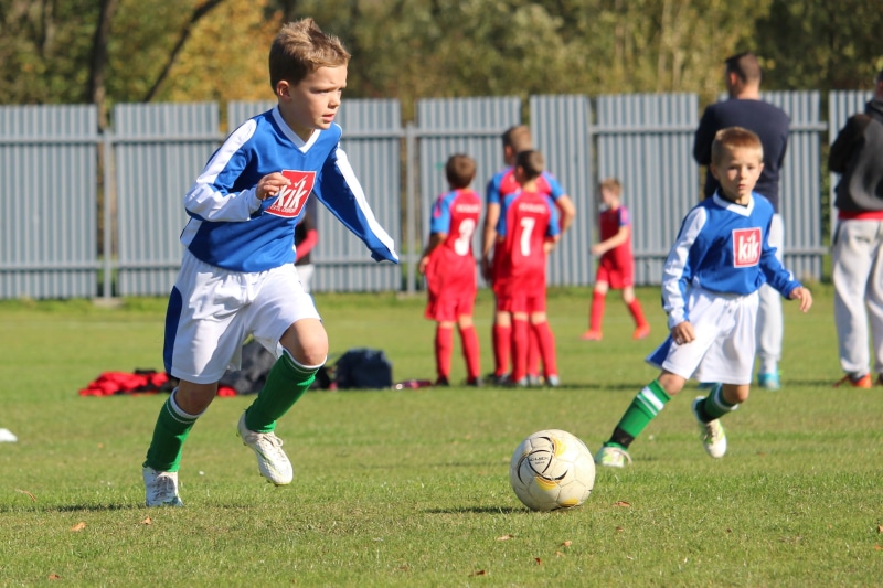 action, offspring, grass, playing, prep, clothing, slovakia, entertainment, sports equipment, childhood, males, full length, sports clothing, men, team