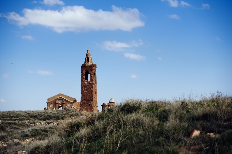 camping, plant, land, sky, shelter, zaragoza, countryside, war, day, structure, ruinas, monumento, field, rural, spain, bell tower, ruins, no people, españa