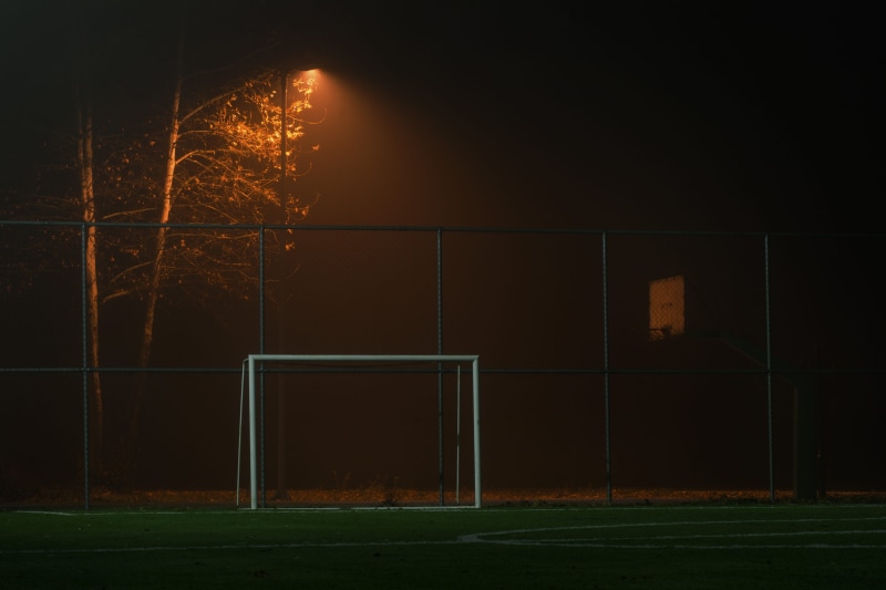 no people, security, lighting equipment, sky, soccer field, architecture, soccer, net, bare tree, building, dark, 4K, night, illuminated, light, sport