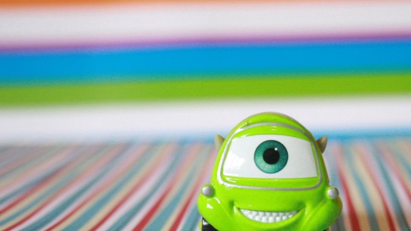 two objects, plastic, green color, eyes, mike, no people, 1080P, sport, water, vehicle, humor, portrait, toy, focus on foreground, selective focus, fun