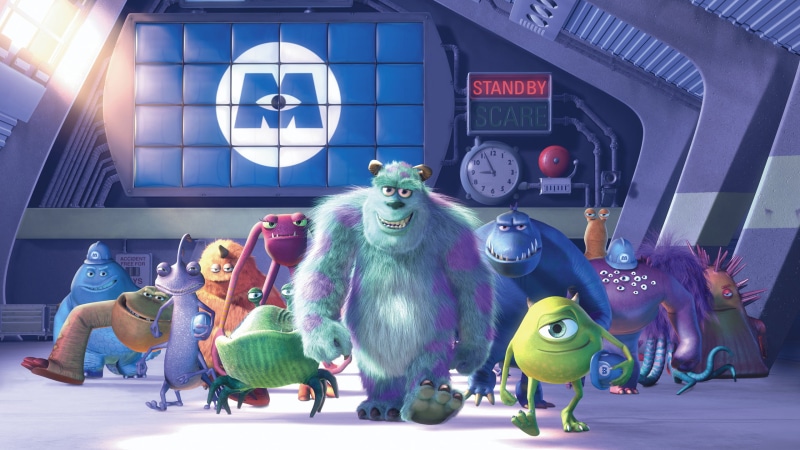 representation, outdoors, built structure, art and craft, illuminated, male likeness, day, human representation, characters, sculpture, Monsters Inc., real people