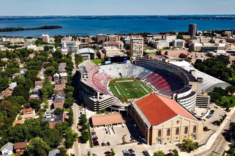 water, buildings, cityscape, day, sports, camp randall stadium, building, photography, city, horizon over water, architecture, travel destinations, high angle view