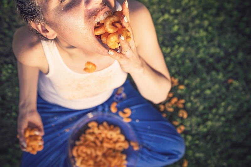 summer, humor, overindulge, front view, outdoors, silly, food and drink, gorging, snacks, females, plant, mouthful, mouth, holding, stuffing, lazy, girl