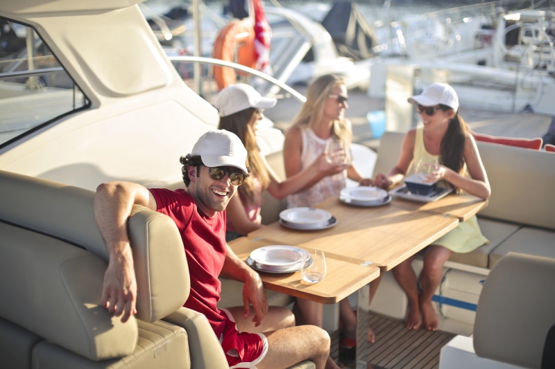 food and drink, eat, beauty, smile, friendship, casual clothing, enjoyment, women, eating, boat, lifestyles, sitting, four, recreation, fashion, sunglasses