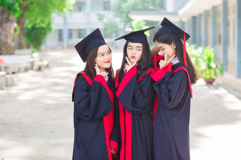 graduate, regala, fun, person, youth, education, women, student, standing, group, learning, emotion, teenagers, college, graduation gown, togetherness