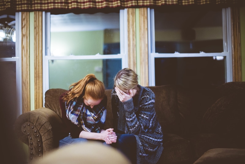 indoors, leisure Activity, lifestyles, family, two woman, adults Only, man, emotion, enjoyment, smiling, young Adult, friend, domestic Life, woman, together