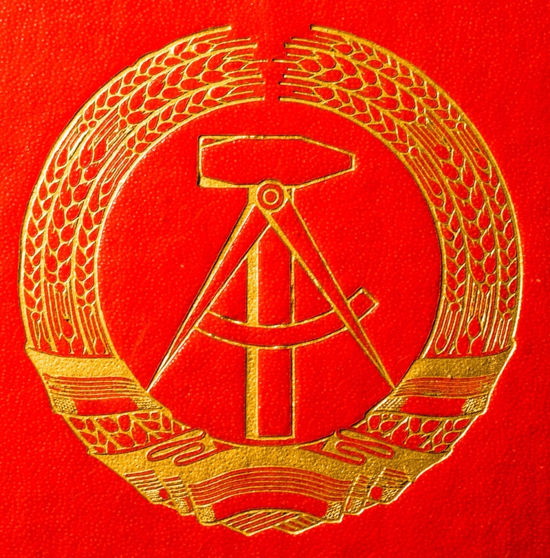 indoors, red background, shape, creativity, red, pattern, east, symbol, coat of arms, east germany, craft, design, old, art and craft, historically, circle