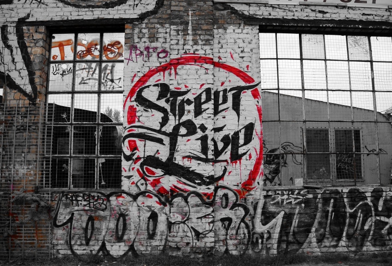 western script, text, no people, raw, sprayer, house facade, day, wall, 2K, war, communication, building, window, creativity, berlin, art and craft, Graffiti