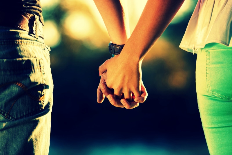 2K, real people, protection, standing, sunlight, human Hand, power, full screen, pair, feelings, adult, woman, togetherness