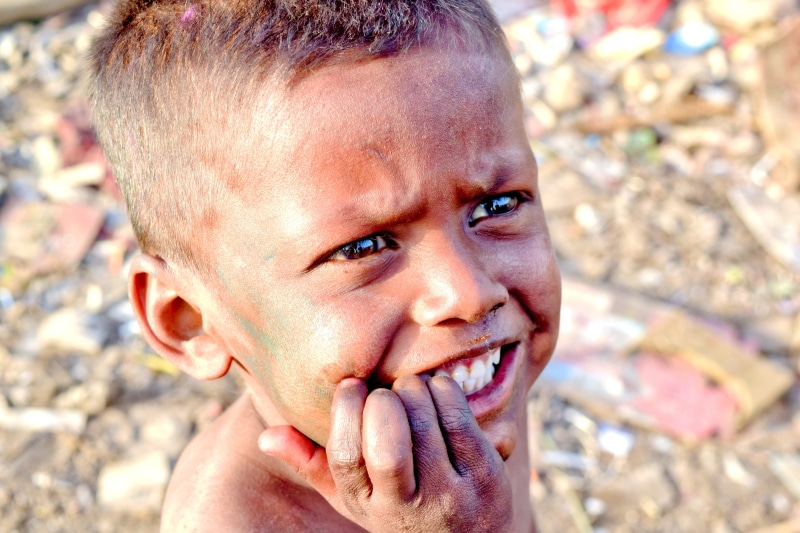 india, smile, males, looking at camera, hindu, portrait, loving, childhood, one person, poor, face, social issues, headshot, boys, poverty, human face