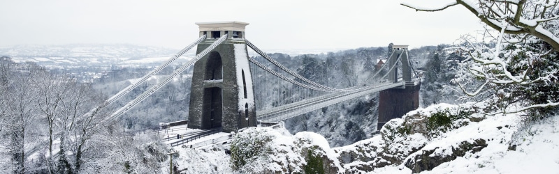 cold temperature, steel, bridge - man made structure, snow, nature, suspension, connection, transportation, built structure, day, mountain, environment