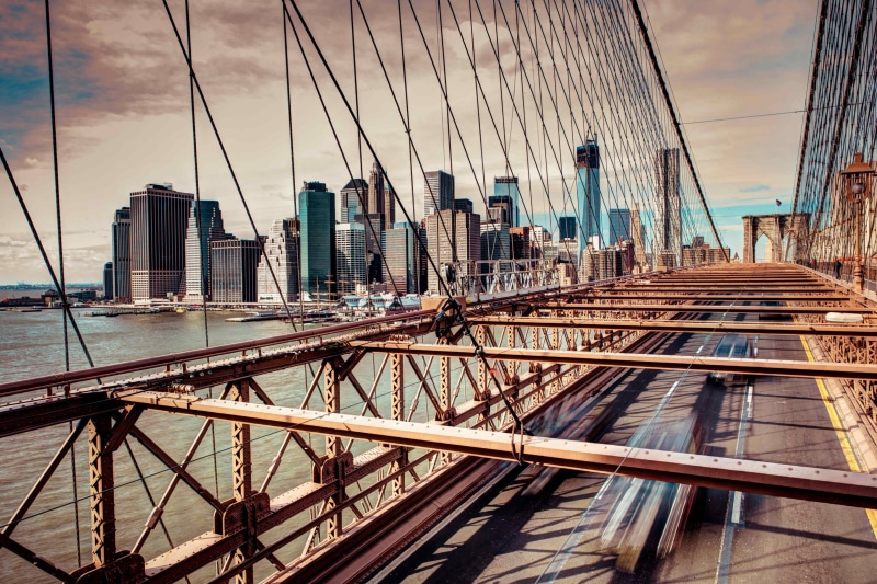 bridge - man made structure, suspension bridge, Brooklyn Bridge, water, connection, steel cable, mode of transportation, architecture, skyscraper, travel