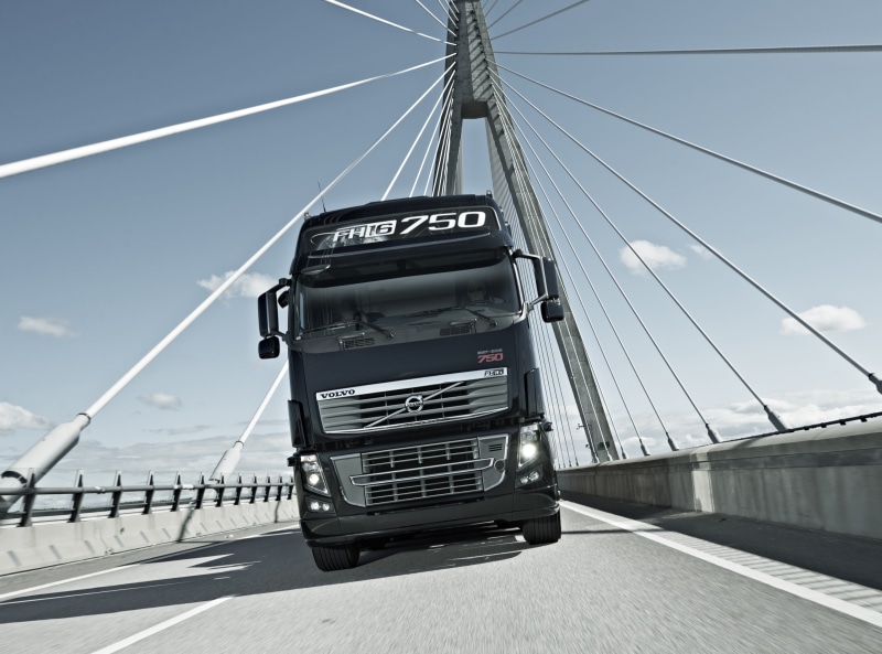 architecture, road, land vehicle, mode of transportation, freight, connection, no people, nature, built structure, city, Volvo, sky, bridge, bridge - man made structure