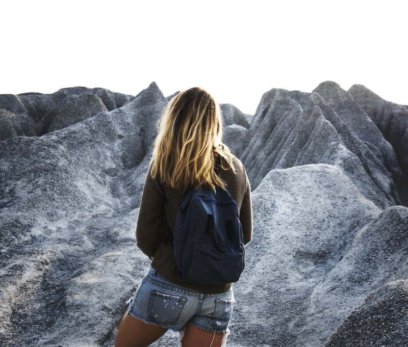 leisure activity, casual clothing, real people, wearing, three quarter length, mountain, enjoyment, outdoors, lake, young, dom, shorts, rock, nature, scenics - nature
