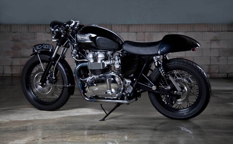 Motorcycles, black color, no people, luxury, racer, black, side view, mode of transportation, wall - building feature, cafe, stationary, bicycle, flooring