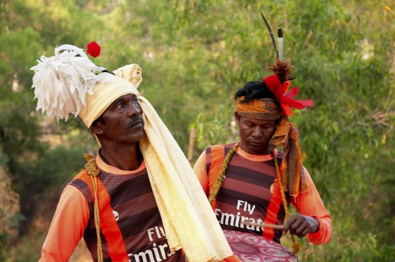 spring, indian, outdoors, arts culture and entertainment, headwear, two people, focus on foreground, holiday, nature, tribal, people, traditional clothing