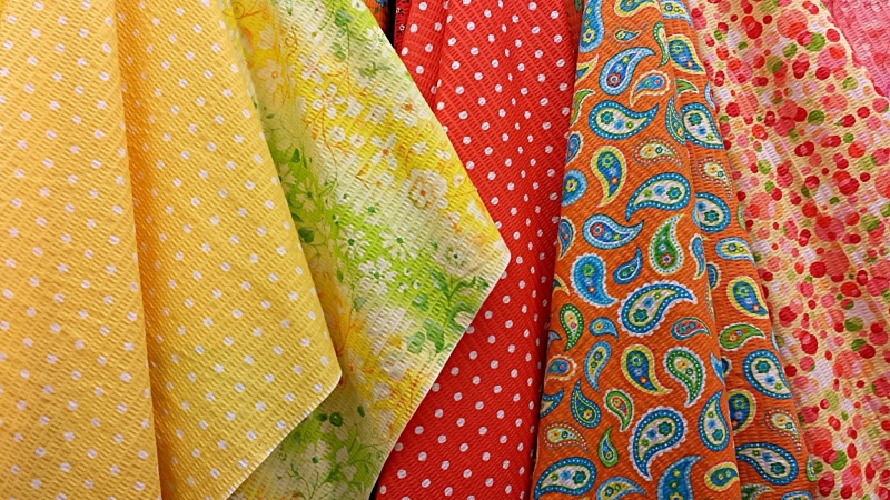 linen, fabric, pattern, ornate, green color, art and craft, tailor, material, leaf, textile, thread, female, orange, textiles, no people, industry, surface