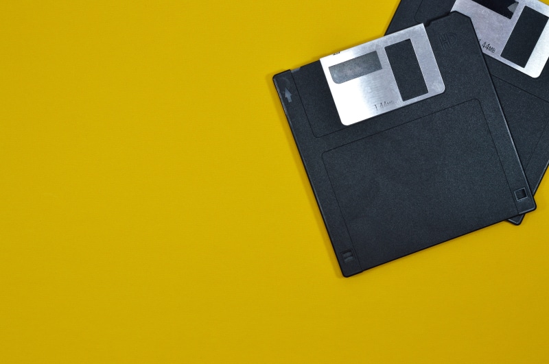 yellow background, copy space, file, technology, no people, two, bag, storage, 5K, office, team, formatted, still life, black, support, blank, old, floppy