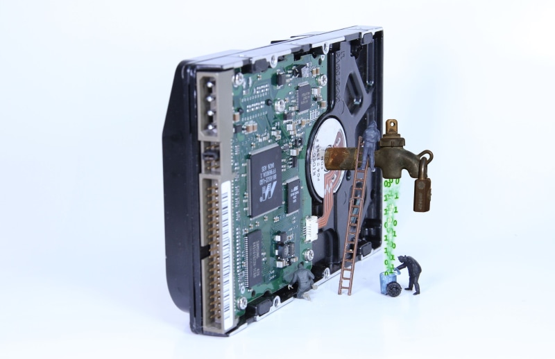 abuse, computer chip, hdd, data flow, computer equipment, single object, data, data leakage, creative, toy figure, electrical equipment, built structure