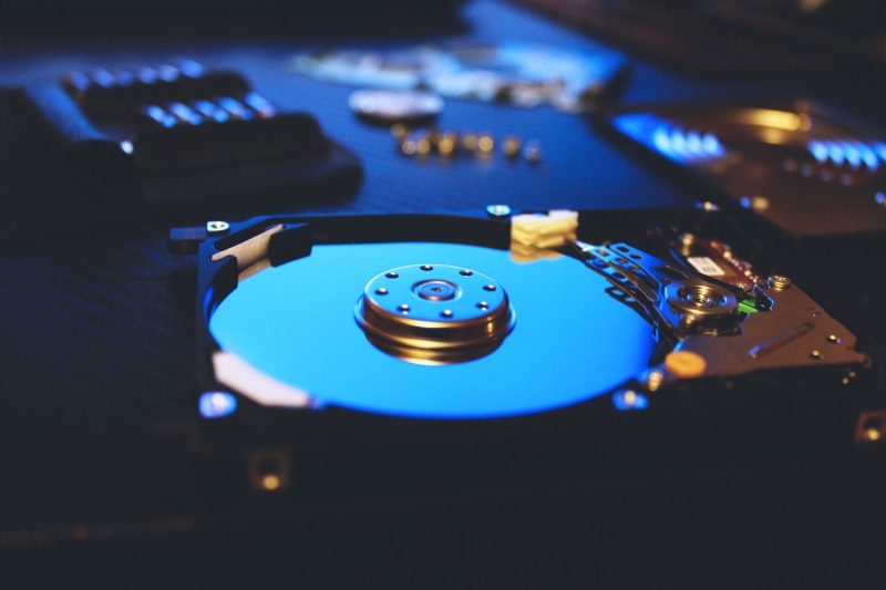 audio equipment, indoors, music, drive, data, 2K, disc, high angle view, computer, no people, hard, arts culture and entertainment, selective focus, hard Drive
