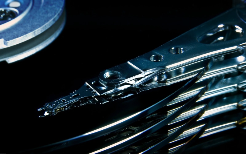 extreme close-up, black background, studio shot, communication, equipment, no people, metal, music, turntable, macro, indoors, technology, Hard drives