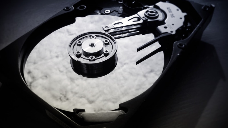 focus on foreground, no people, circle, computer, monochrome, Hard drives, geometric shape, land vehicle, equipment, metal, indoors, mode of transportation