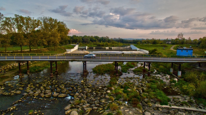 clouds, water, built structure, travel destinations, the firewall, transportation, brook, environment, nature, way, footbridge, cloud - sky, outdoors, grodzisko