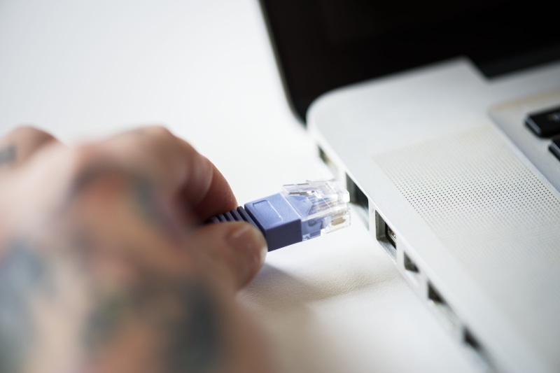 lan, lan cable, blur, desk, one person, cable, digital, connection, device, holding, person, inserting, communication, ethernet, 4K, table, technology