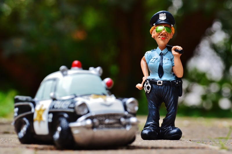 man, outdoors, action, males, handcuffs, sport, transportation, childhood, 4K, fun, police car, one person, mode of transportation, innocence, car, crash helmet