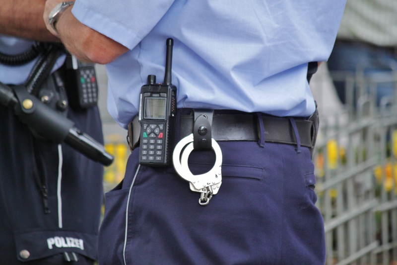 watch, one man only, officer, law, belts, midsection, government, leather, protection, one person, walkie-talkie, security, weapon, baton, monitoring, day