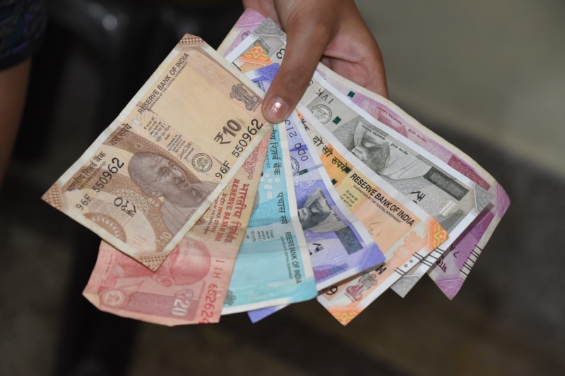 human body part, unrecognizable person, representation, human hand, cash, holding, one person, rupees, close-up, currency, wealth, paper currency, business