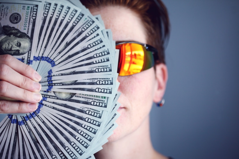 young adult, glasses, economist, banking, colored background, headshot, cash, resources, hand, investor, business, studio shot, leadership, adult, finger